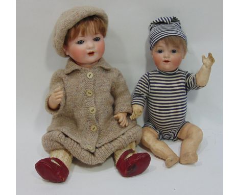 2 bisque head baby dolls by Armand Marseille both with 5 piece bent limb composition bodies; larger doll height 48cm has clos