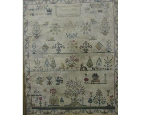 A late 18th century Scottish needlework sampler by Margaret Hare of Dunfermline, dated 1797, incorporating Adam and Eve and t