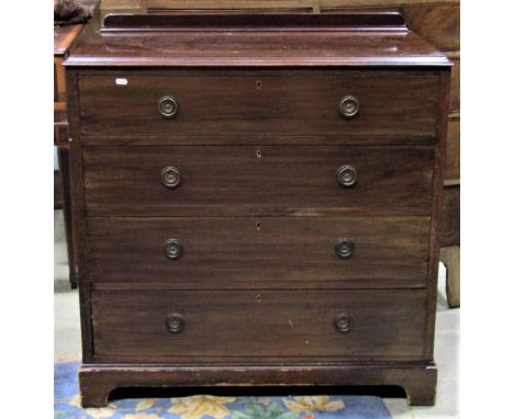 An Edwardian mahogany bedroom chest of four long graduated drawers with embossed ring brass handles, 93 cm wide x 91 cm high 