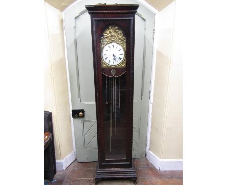 20th century longcase clock in the 19th century French manner, the glazed case enclosing an embossed brass fascia, with conve