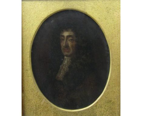 A follower of Sir Peter Lely (Dutch 1618-1680) - Bust length portrait of King Charles II, oil on board? (not removed from fra