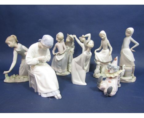 A Danish B&amp;G figure of a young female ceramic artist (af to neck) together with four matt glazed Lladro figures and two f