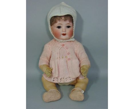 An Ernst Steinbacher bisque head baby doll (1900-1912), marked 'E.St.P 23 7½' Germany', sleeping brown eyes, open mouth showi
