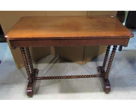 A Victorian mahogany stretcher table with rectangular top and turned bobbin rails, 92 cm long x 48 cm wide 