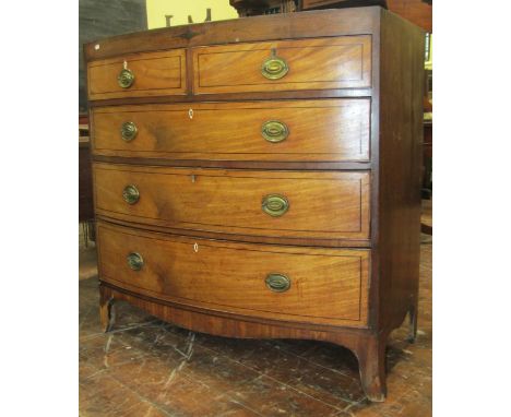 A Regency mahogany caddy top bow front chest of three long and two short graduated drawers with ebony string inlay, original 