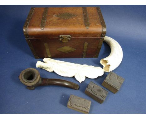Mahogany and brass banded tea caddy, three small printing blocks, carved bone work leaf, etc 