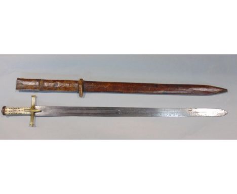 19th century Sudanese broad sword with leather scabbard, the blade with crested moon detail, the grip with bonework and brass
