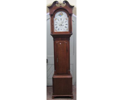 A Georgian oak longcase clock, the trunk with column supports, the hood with swan necked pediment enclosing a 33 cm broken ar