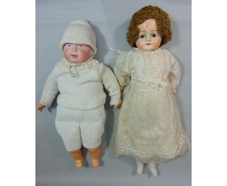 2 early 20th century dolls;  Gebruder Knoch 205 bisque shoulder-head character doll, circa 1910, with blue intaglio eyes, ope