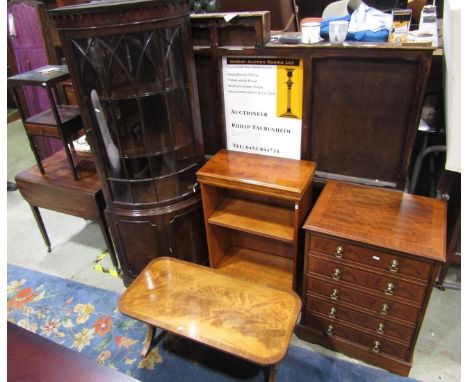 A reproduction Georgian style freestanding bow fronted corner cabinet enclosed by three doors, the upper astragal glazed, 180