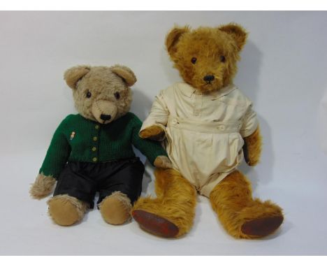 2 large vintage teddy bears both with jointed body, pronounced snout and stitched mouth and nose; larger bear has long golden