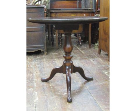 Good quality Georgian mahogany snap top table, the dense mahogany single piece 75 cm in diameter, raised on a birdcage and va