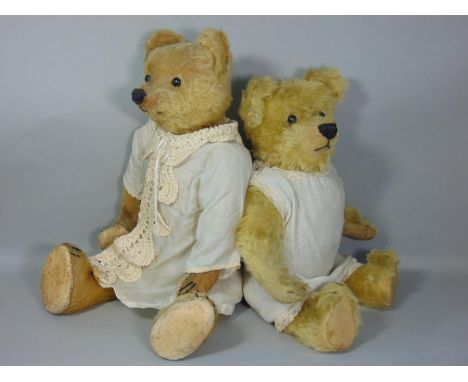 2 vintage teddy bears both with boot button eyes, stitched mouth, nose and claws, pronounced nose, long tapering limbs and fe