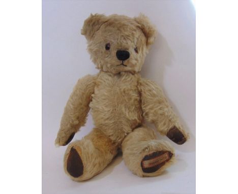 1930's small teddy bear by Chad Valley with soft plus fur, stitched nose and mouth, glass eyes, jointed limbs, height 32cm 