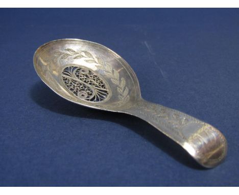 Good quality George III silver caddy spoon, the bowl with central filigree panel, with further engraved geometric leaf decora