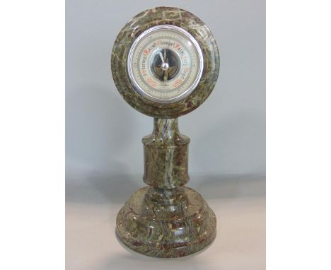 Serpentine desk top barometer, 28 cm high 