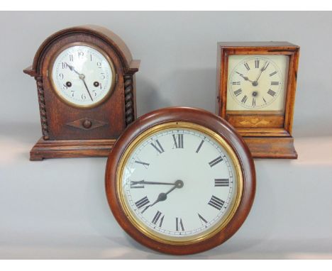 A 19th century boxwood inlaid fruitwood shelf clock together with a further early 20th century oak barley twist twin train ma