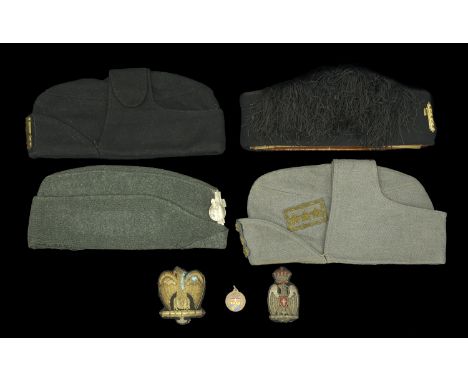 A small collection of Italian Fascist Side Caps and Badges  An Italian Fascist Youth Bustina Side Cap, with badge attached as