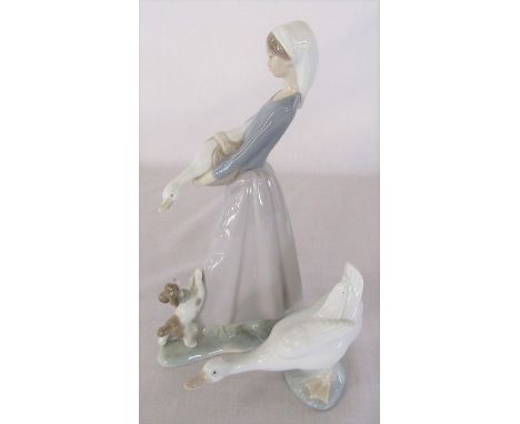 Lladro figure of a girl with goose and dog (previously repaired) and a Nao figure of a goose