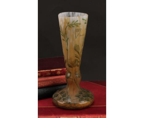 A Daum Nancy cameo glass vase, decorated with flowers on a mottled ground, 22cm high, signed