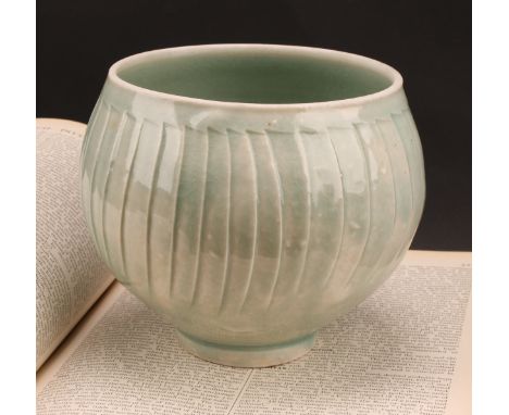 David Leach (1911 - 2005) - a studio pottery porcelain ribbed ovoid vase, pale green celadon glaze, 14cm high, monogram