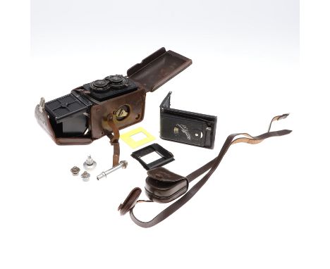 VINTAGE ROLLEIFLEX CAMERA &amp; ACCESSORIES. A Rolleiflex Franke &amp; Heidecke twin lens Compur Camera with Tessar 1:35 lens