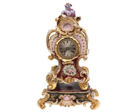 LARGE FRENCH PORCELAIN CLOCK - CHARPENTIER SAINT MALO. A rococo style porcelain mantle clock, painted with a small panel of f