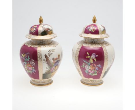 PAIR OF LARGE DRESDEN LIDDED JARS. A pair of large jars painted with alternating panels of courting couples and sprays of flo