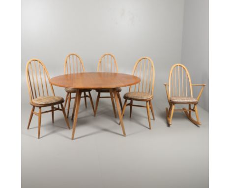 ERCOL DROP FLAP TABLE &amp; FOUR DINING CHAIRS, &amp; A ROCKING CHAIR. A vintage light elm and beech drop flap table (112cms 