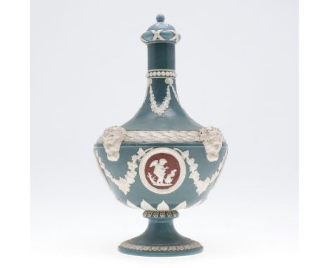 WEDGWOOD TRI COLOUR JASPER WARE LIDDED VASE. A 19thc lidded vase with four small vignettes of cherubs on a dark red ground, w