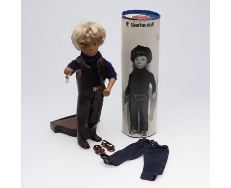 VINTAGE BOXED SASHA DOLL - TRENDON LTD. The large doll with blond hair, and dressed in a leather waistcoat, trousers and shoe