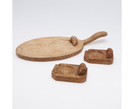 ROBERT THOMPSON OF KILBURN CHEESE BOARD &amp; TWO SMALL DISHES. An oval cheese board with curved handle and carved 'Mouse' si