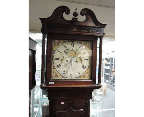 A late 18th century oak longcase clock having swan neck and pillar hood containing square painted moonphase dial on shaped tr