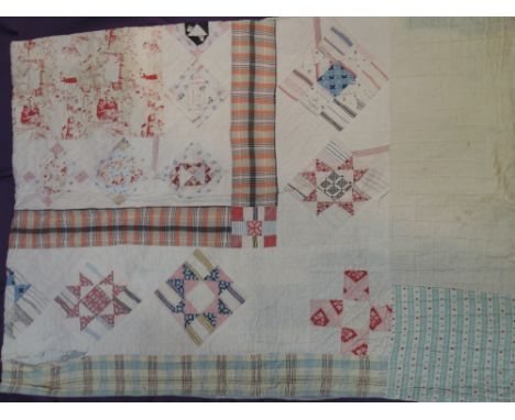 A pretty early 20th century patchwork bed cover, approx a single or small double in size, some age related wear.