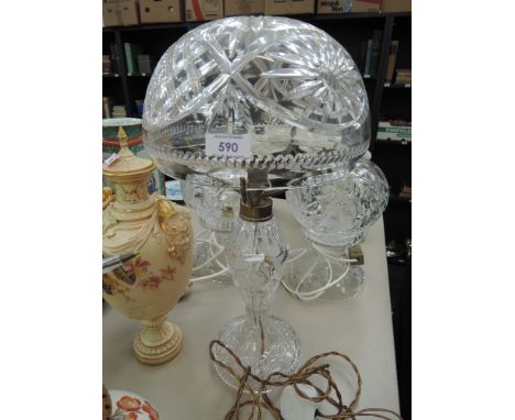 A traditional glass table lamp of mushroom design