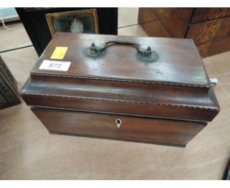 An early 19th century mahogany tea caddy having rope twist inlay detail