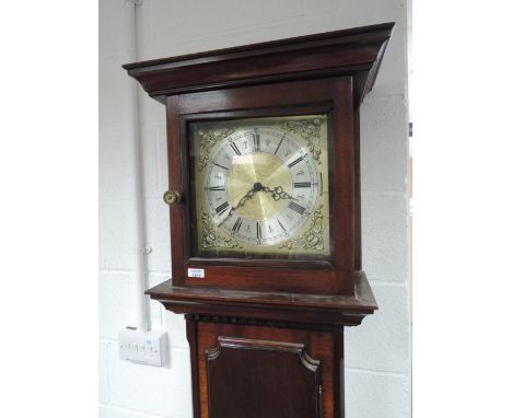 A modern reproduction longcase clock having square hood containing silvered and brass dial on shaped trunk and square base