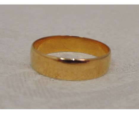 A 22ct gold wedding band, size K &amp; 2.2g