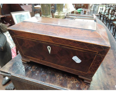 An early 19th century mahogany tea caddy of sarcophagus shape, having fitted interior and later bracket feetCONDITION REPORTP
