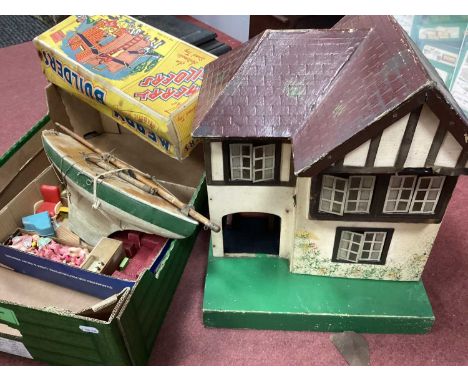 A 1930s Dolls House as a Period Detached House with Car Port and Tinplate Windows, Triang logo to rear, a quantity of dolls h