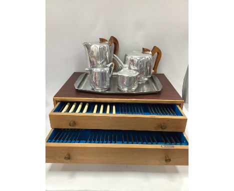A Canteen of Walker &amp; Hall Silver Plated Cutlery, Newmaid four-piece tea service, stainless steel tray.Case with all over