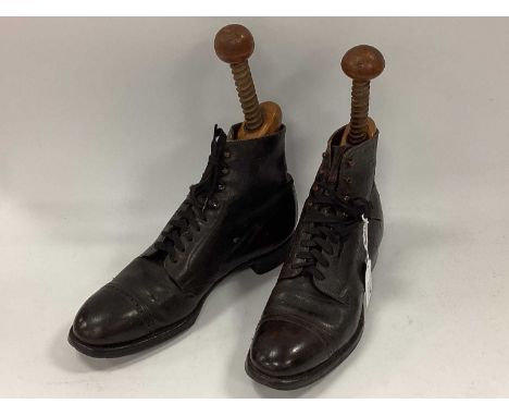 A Pair of Edwardian Black Leather Boots, together with similar period wooden shoe trees.