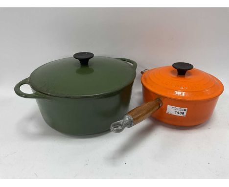 Le Creuset Orange Enamel Lidded Pan Stamped '18', cousances 22 example in green (lid cracked) (2).