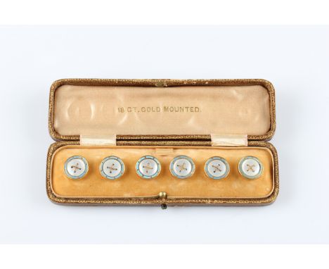 A boxed set of enamel and mother of pearl buttons, all stamped 18ct.