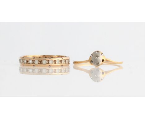 A paste full eternity ring, set with colourless paste stones, yellow metal stamp 9ct, ring size K, together with a diamond fl