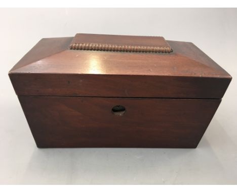 A mahogany tea caddy, with glass vase to interior.