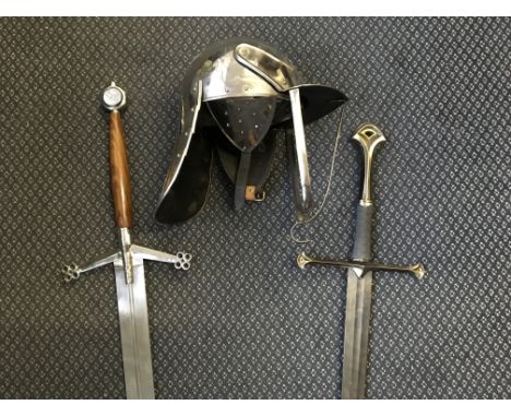 A Medieval knights helmet, Scottish claymore, and Lord of the Rings King sword.