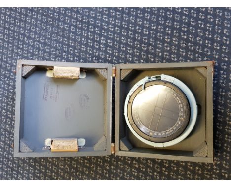 A WWII type P11 aircraft compass for spit fire or hurricane. First exam action date 12th June 1944 in original wooden box.