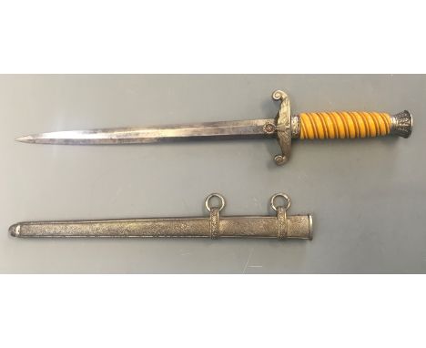 A Nazi German Army (Heer) dagger WKC Solinger with orange handle.