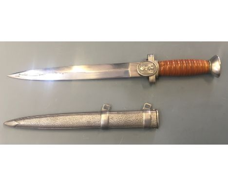 A Nazi Grerman Red Cross dagger with orange handle scabbard.